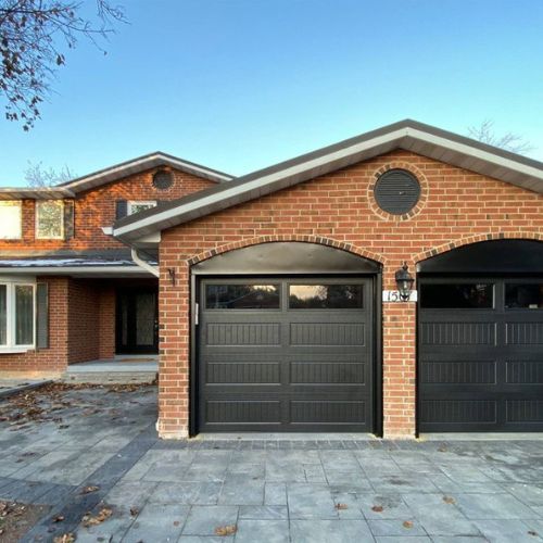 How can a new garage door reduce my energy bills