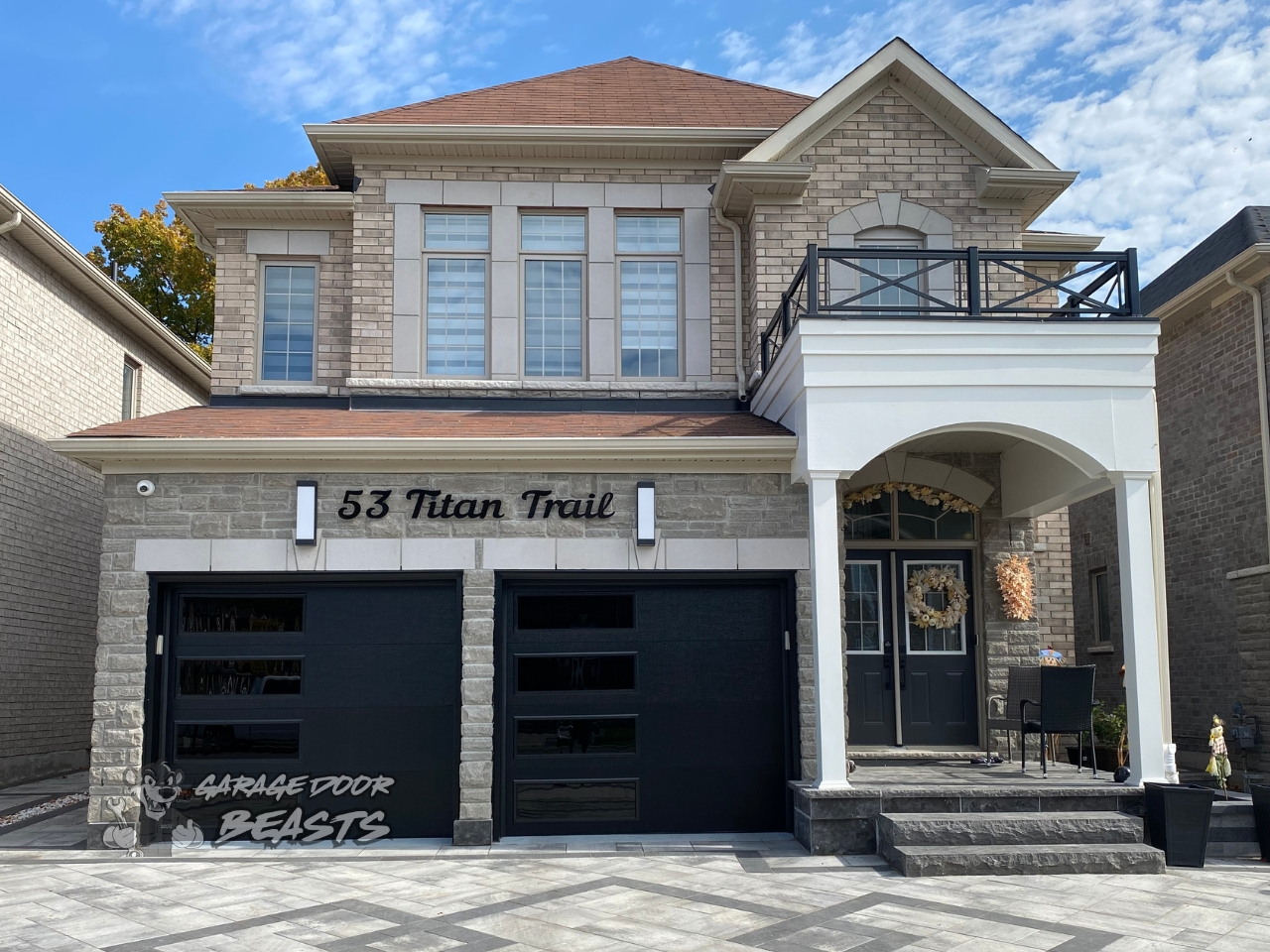 8'x7' Garage Door Installation - Black Flush Panels with Black Tinted Windows on the Side - Garage Door Beasts