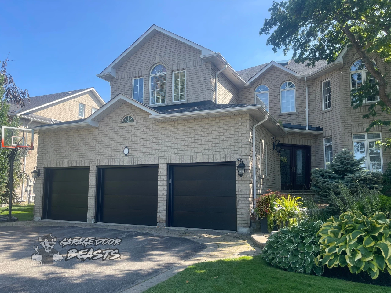 9'x7' Garage Door Installation - Modern Flush Black No Windows - Garage Door Beasts