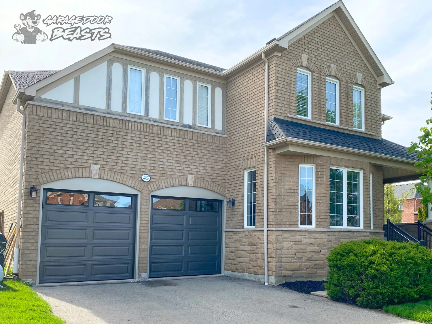Garage Door Beasts - Dark Brown Long Raised Garage Doors with Sandstone Aluminum Capping